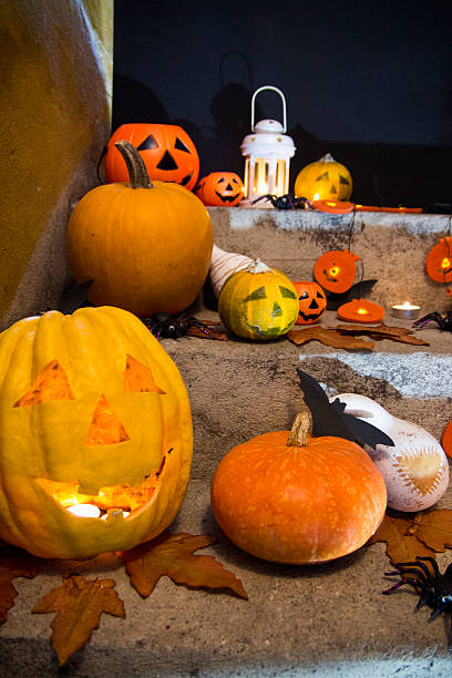 istock Halloween pumpkin head jack lantern on wooden background 609832892