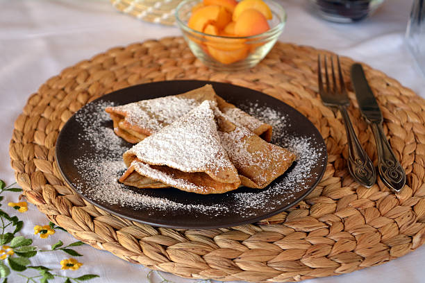 istock Homemade pancakes with jam and icing sugar. 609832966