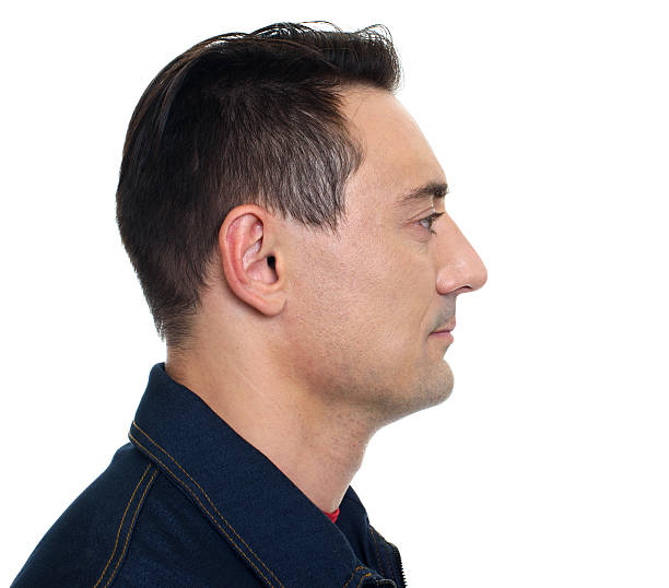 istock Profile view of smiling confident man 609833908