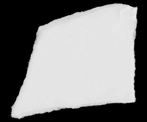 istock Torn White Paper Scrap Isolated on Black Background 609835798