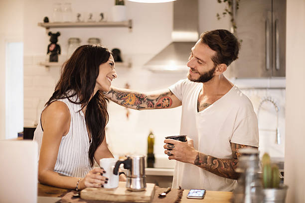 istock Young couple at home - Morning breakfast time 609837544