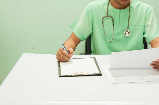 Doctor analyzing medical EKG
