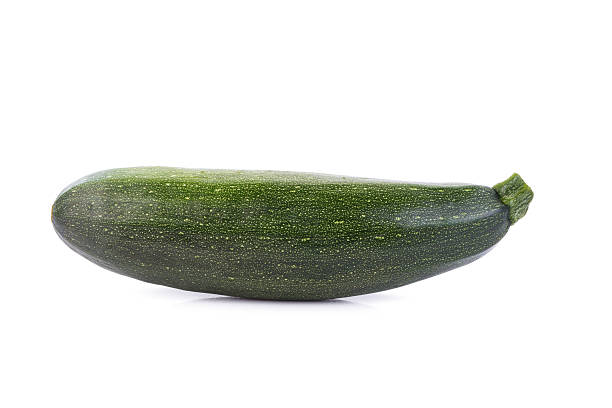 istock green zucchini vegetables isolated on white 609903638