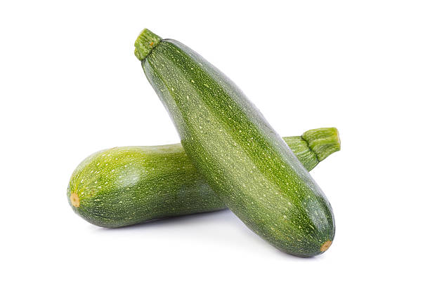 istock green zucchini vegetables isolated on white 609903678