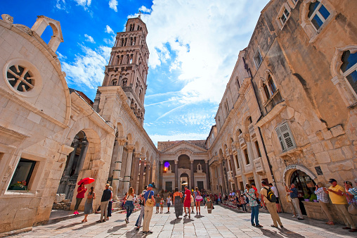 Split, Croatia - September 21, 2016: Tourist and locals walking on the Peristil of the Diocletian's palace