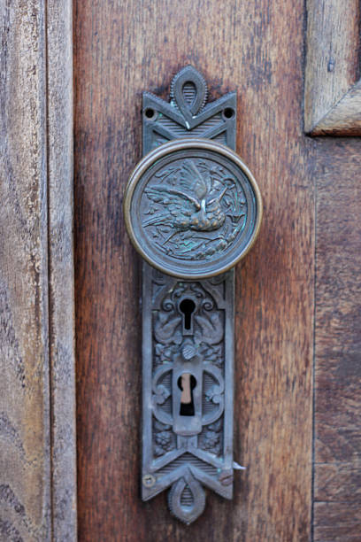 istock Antique Door Handle on Wooden Door 609910190