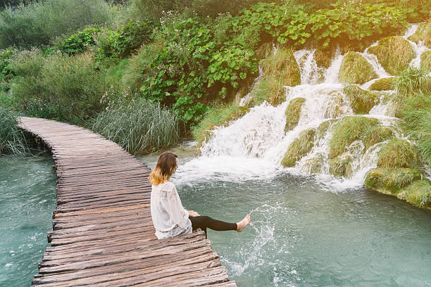 istock Woman in Plitvice National Park 609917276