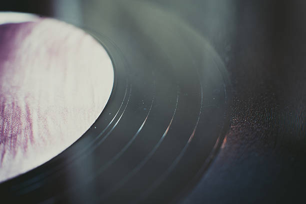 istock Vintage vinyl record groove close up 609918460