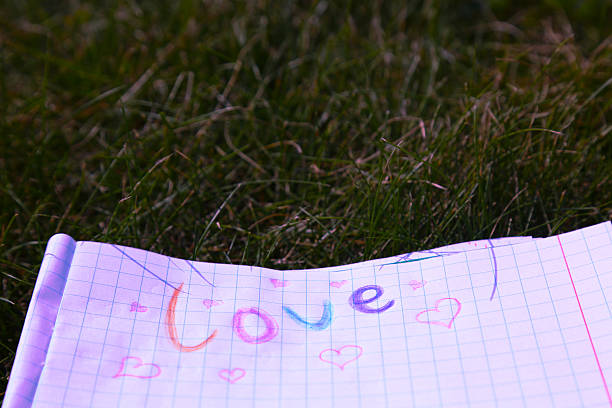word love written with plasticine