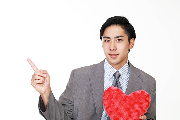 istock Asian businessman pointing 609929756