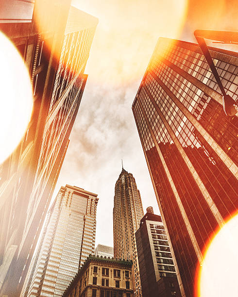 istock manhattan office building double exposure with empire state building 609930562