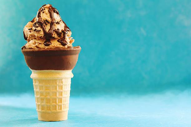 istock Homemade Chocolate Mocha Ice cream cone, selective focus 609931212