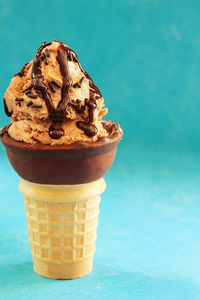 istock Homemade Chocolate Mocha Ice cream cone, selective focus 609931228