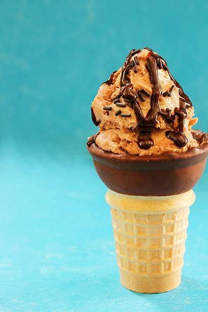 istock Homemade Chocolate Mocha Ice cream cone, selective focus 609931238