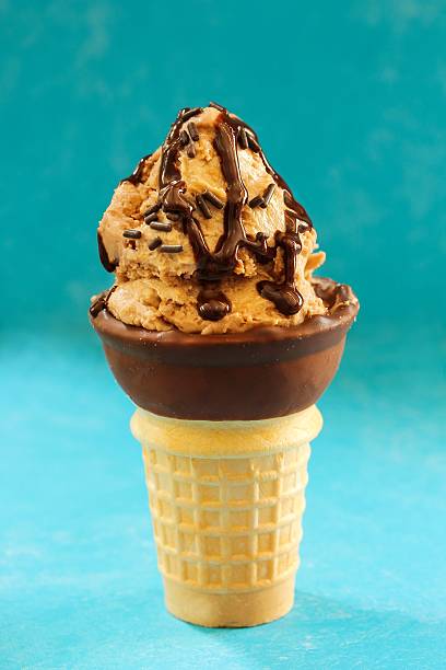 istock Homemade Chocolate Mocha Ice cream cone, selective focus 609931244
