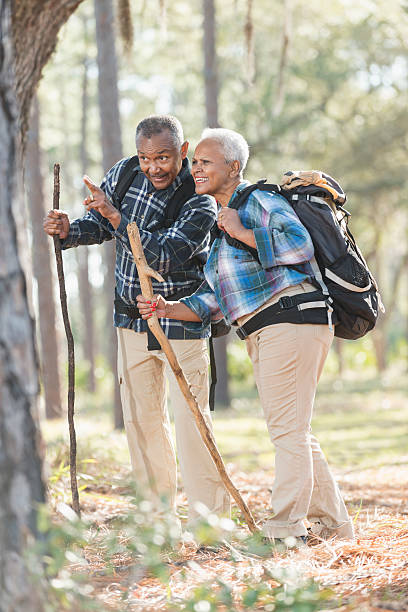 istock African American seniors hiking through woods 609931786