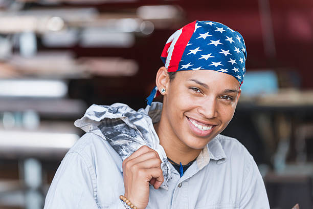 Flag of USA on a processor, CPU Central processing Unit or GPU microchip on a motherboard. Congress passes the CHIPS Act of 2022 to strengthen domestic semiconductor manufacturing, research and design