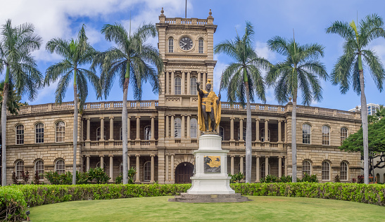 Honolulu, USA - August 6, 2016: King Kamehameha I Statue, by Thomas Gould, on August 6, 2016 in Honolulu, Hawaii. It is in front of Ali iolani Hale, the Hawaii Supreme Court Building on King Street in Honolulu.