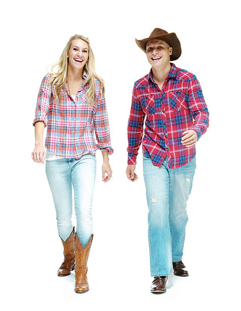 istock Cheerful cowboy walking together 609938476