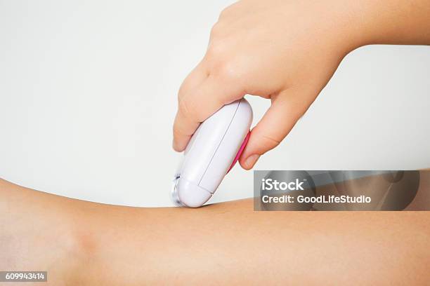 Woman Shaving Her Legs Stock Photo - Download Image Now - Adult, Adults Only, Beauty Product