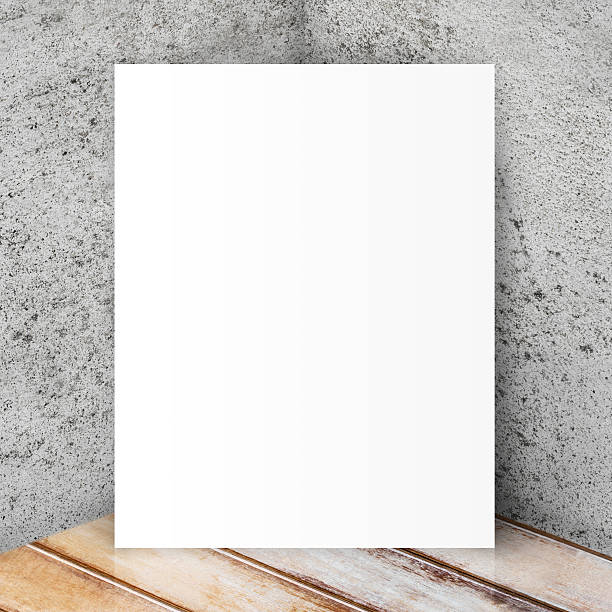 istock White mockup template paper on wood floor. 609943886