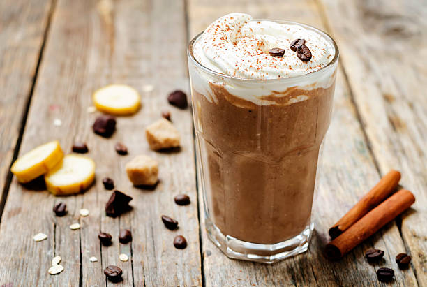 istock coffee chocolate banana smoothie with coconut whipped cream 609945918