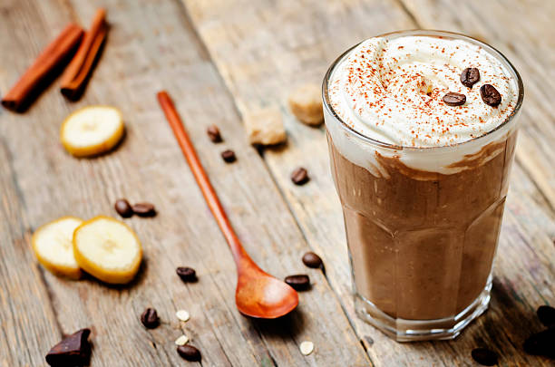 istock coffee chocolate banana smoothie with coconut whipped cream 609945942
