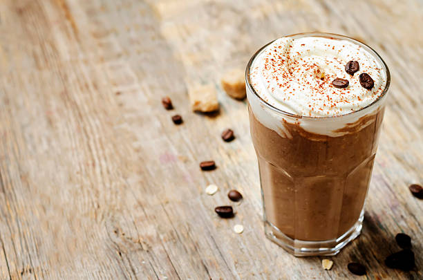 istock coffee chocolate banana smoothie with coconut whipped cream 609945952