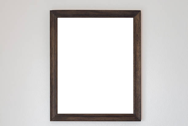 istock Mock up blank frame hanging on wall in room 609947130