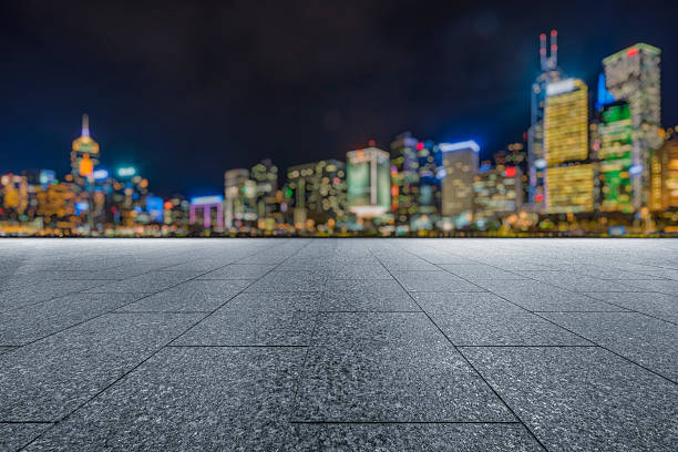 istock empty pavement front of  hong kong victoria skyline 609949124