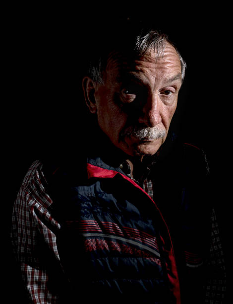 istock Senior man sombre portrait 609951026