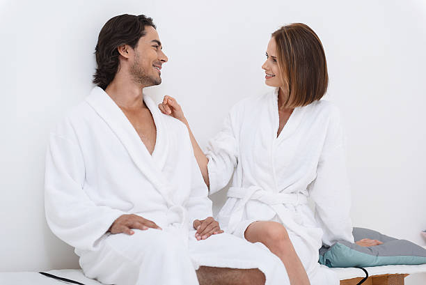 istock Mature couple relaxing together at day spa 609953500
