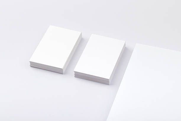 istock Business cards isolated on white 609954408