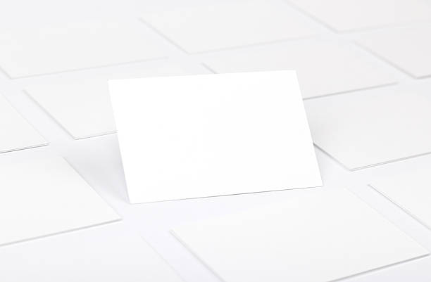 istock Business cards isolated on white 609954560
