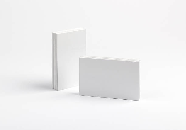 istock Business cards isolated on white 609954598