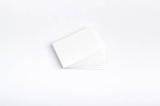 istock Business cards isolated on white 609954820