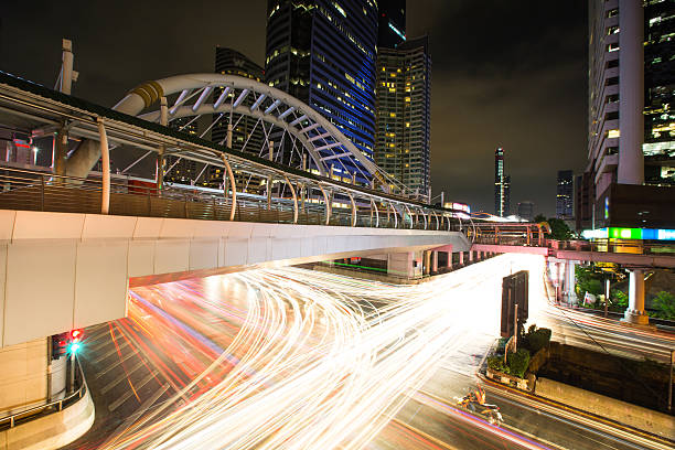 istock skywalk and Business office building background 609955196