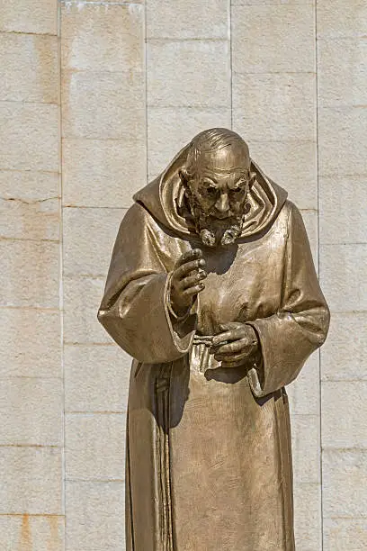 Statue of St. Padre Pio in San Giovanni Rotondo - target of 7 million annual pilgrims