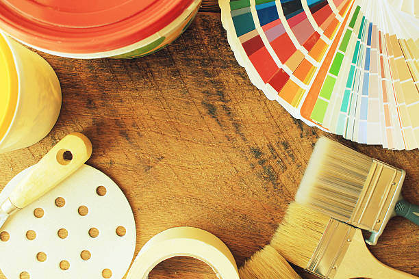istock various painting tools and color guide on wooden background 609956864