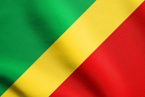 Congo Republic national official flag. African patriotic symbol, banner, element, background. Flag of Republic of the Congo waving in the wind with detailed fabric texture