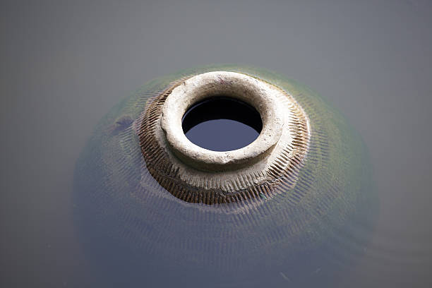 istock abstract of large antique earthen jar. 610006602