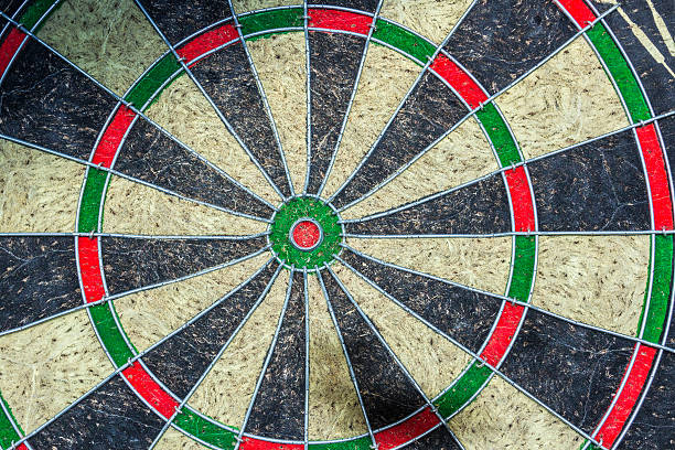 istock Close-up of a very old dartboard, isolated 610006842