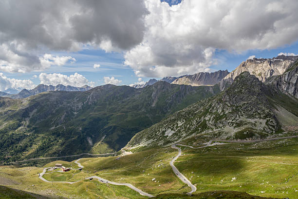 istock Road on Mountain and cloudy sky 610008382