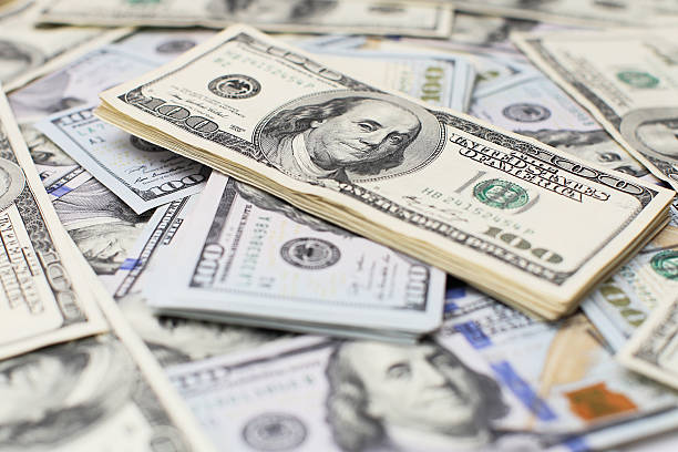 istock Heap of one hundred dollar 610010584