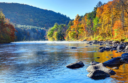 Autumn foliage on the Housatonic River in the Litchfield Hills of Connecticut