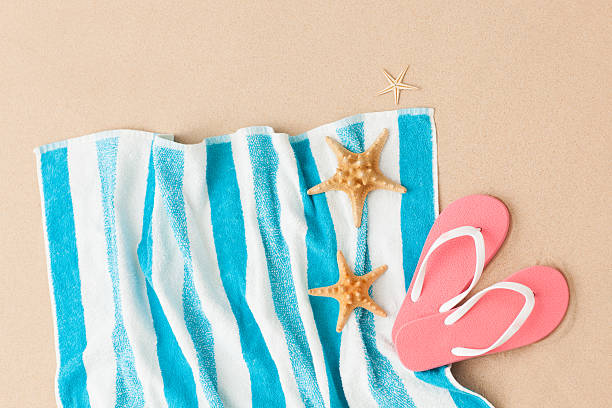 Relax on the shore with beach towel. stock photo