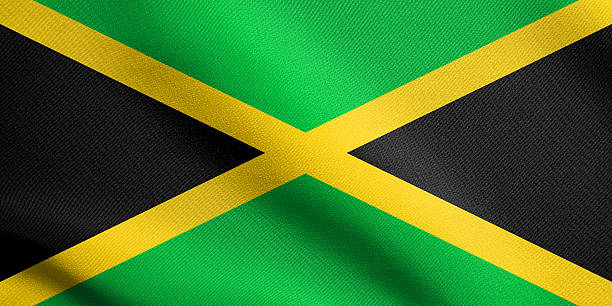 istock Flag of Jamaica waving with fabric texture 610013774