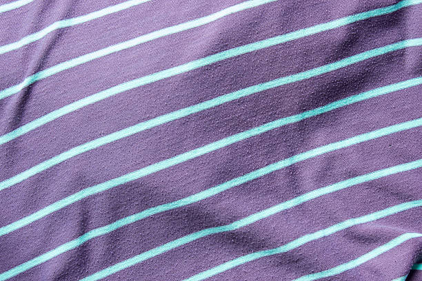istock gray and green stripe fabric background 610015372