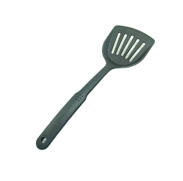 istock spade of frying pan on white background 610016606