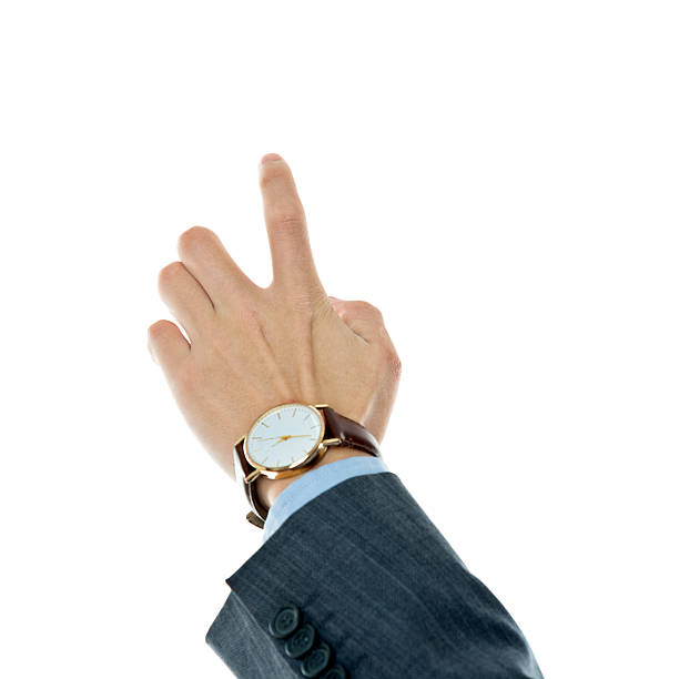 Businessman pointing finger against white background.